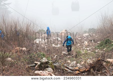 Rescue Man Helping Out On Land With Rope