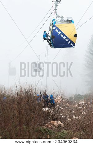 Alpinist Is Rescue People Exercise On Gondola Car