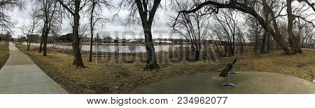 The Big Sioux River Flows Over Rocks In Sioux Falls South Dakota With Views Of Wildlife, Ruins, Park