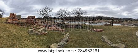 The Big Sioux River Flows Over Rocks In Sioux Falls South Dakota With Views Of Wildlife, Ruins, Park
