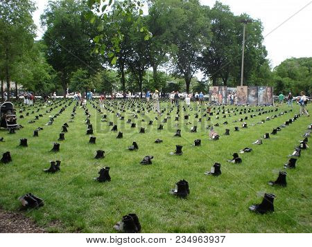 Iraq War Protest Demonstration, Combat Boots Arrayed In A Grass Field In Memory Of The U.s. Military