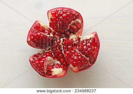 Big Ripe Red Granet Or Garnet. Fruits Of Red Ripe Pomegranate On The White Background. Vegetarian Co