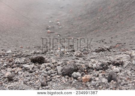 The Etna Volcano. Black Volcanic Earth, Volcanic Lava And Stones. Dense Fog On Mount Etna. Place For