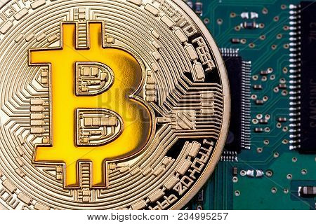 Photo Golden Bitcoin On Macro. High Resolution Photo.