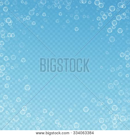 Soap Bubbles Abstract Background. Blowing Bubbles On Blue Transparent Background. Bold Soapy Foam Ov