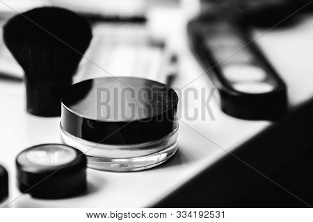 Jar Of Cream On The Table, Next To The Eye Shadow And Brush