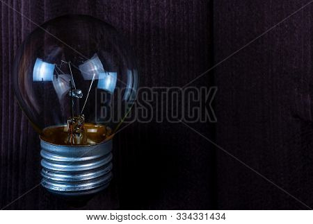 Small Light Bulb On Background.small Light Bulb On Background