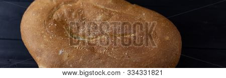 Pita Bread On A Wooden Background.pita Bread On A Wooden Background