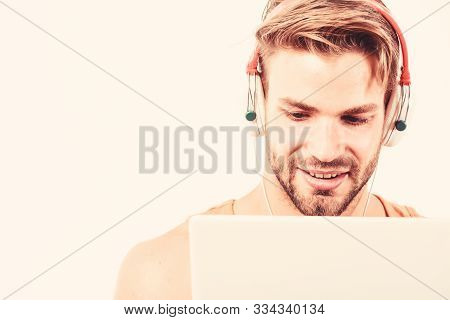 Vide3o Conferencing. Ebook And Online Education. Music Education. Sexy Muscular Man Listen Ebook. Ma