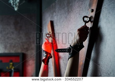 Sexy Woman In Handcuffs. Games For Adults In The Room Bdsm.