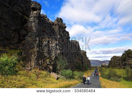 PINGVELLIR NATIONAL PARK, ICELAND, 12 SEPTEMBER, 2019: Tourists visiting Pingvellir National Park, Iceland, Europe