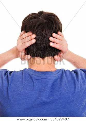 Rear View Of A Man Covering His Ears From A Noise On The White Background Closeup