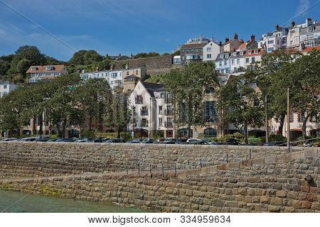 Scenic View Of A Bay In St. Peter Port In Guernsey, Channel Islands, Uk