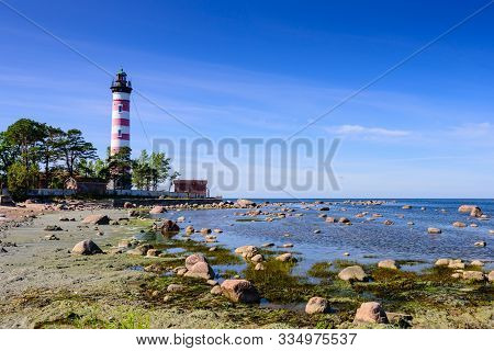 Shepelevsky Lighthouse On The Picturesque Coast Of The Gulf Of Finland. Beautiful Summer View Of The