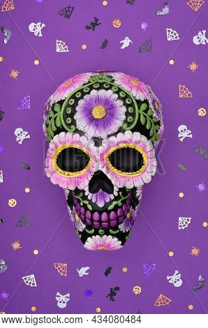 Happy Halloween Concert Or El Dia De Los Muertos. Decorative Black Skull Decorated With Flowers On A