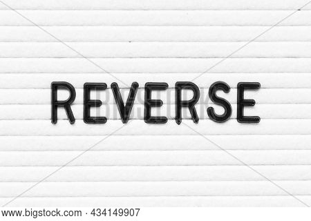 Black Letter In Word Reverseon White Felt Board Background