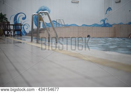 PALEMBANG, INDONESIA - OCTOBER 30 2015 : the view from the side of the swimming pool during the day