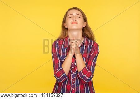 Please Im Begging. Portrait Of Despaired Ginger Girl In Shirt Keeping Arms In Prayer Gesture And Hol