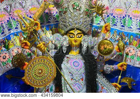 Face Of Goddess Durga Idol, Durga Puja Festival At Night. Shot Under Colored Light At Howrah, West B