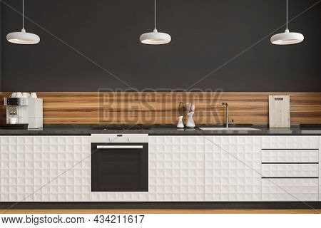 Kitchen Interior With Stylish Grey And White Design, Three Ceiling Lamps, A Wood Splashback And Text