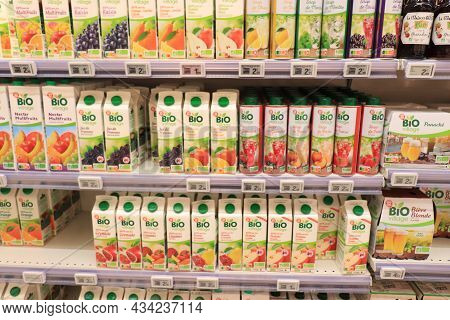 Autun, France - September 17th 2021: Colorful Packs Of Orange Juice In A Supermarket. Tags: Price An