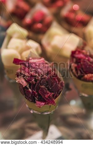 Cones Or Cucurucho Pintxos Or Tapas With Spanish Serrano Iberico Ham Carvings, Sausage And Cheese Pi