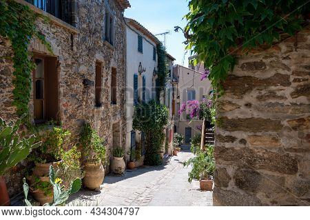 Walking On Ancient French Village Grimaud, Touristic Destination With Ruines Fortress Castle On Top,