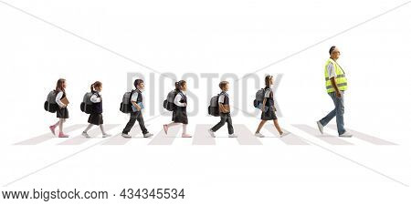 Man wearing a safety vest and leading schoolchildren across a street on a crosswalk isolated on white background