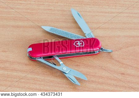 Pruszcz Gdanski, Poland - July 17, 2021: Opened Red Swiss Army Knife Victorinox.