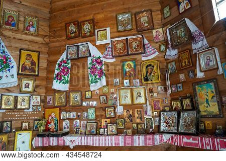 Ukraine, Kyiv - September 5, 2021: Many Different Old Icons On The Iconostasis Of A Wooden Orthodox 