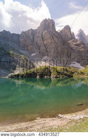 View Of Lake Coldai, Near The Coldai Refuge On Mount Civette In The Belluno Dolomites During A Sunny