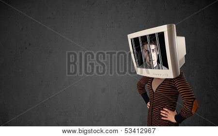 Business man with monitor screen on his head traped into a digital system concept