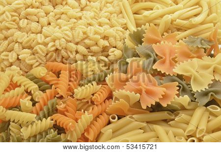 A closeup of three types of colored pasta