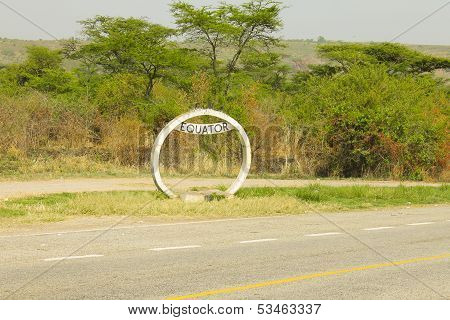 Sign Of The Equator On The Road In Uganda.