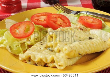 Spinach Rollatini With Alfredo Sauce