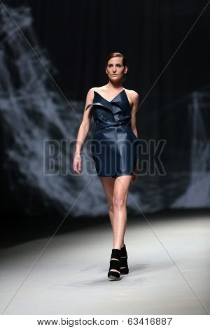 ZAGREB, CROATIA - APRIL 10 : Fashion model wears clothes made by Petra Vuletic and Sasa Hortig on 