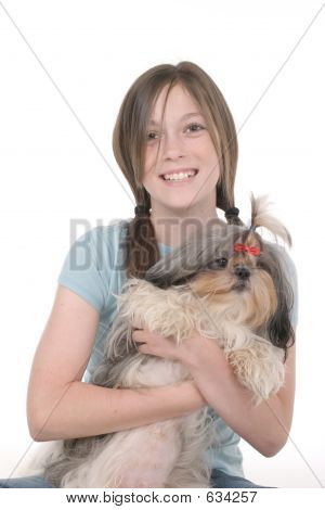 Perrito niña Holding 