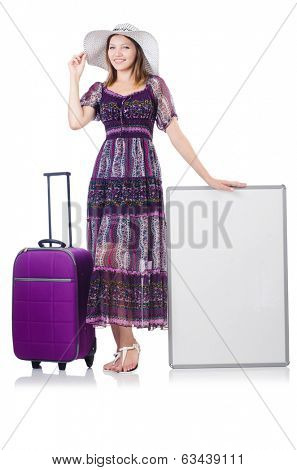Woman in panama  preparing for travel  with suitcases and blankboard  isolated on white