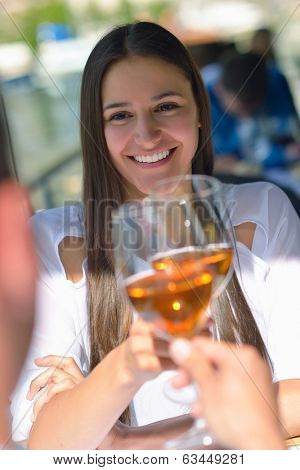 happy young couple having lanch at beautiful restaurant on by the sea on  beach
