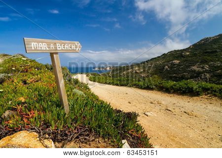Signpost Pointing To The Beach At La Revellata Near Calvi In Corsica