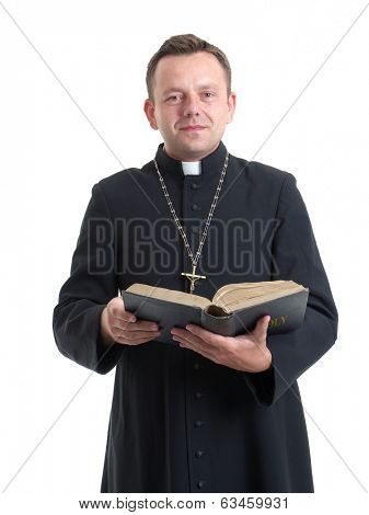 Catholic priest reading from the Bible, against a white background.