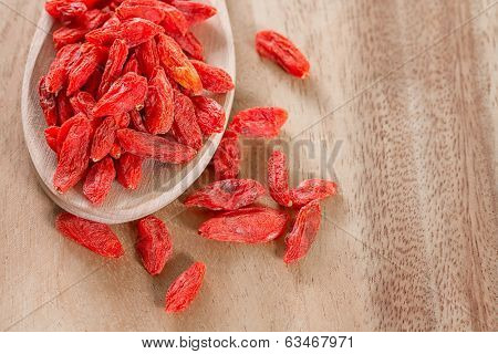 goji berries on wooden background