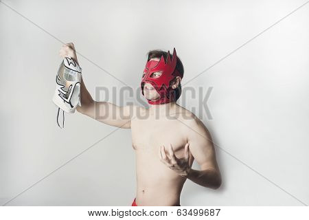 Fighter posing with mexican mask