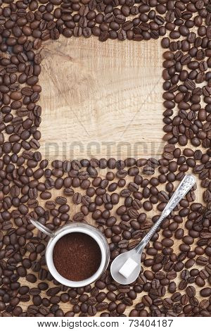 Coffee beans on a wooden background