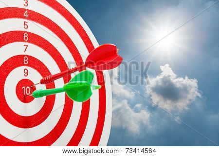 two dart hitting a target