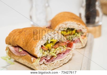Cut Italian Sub On Wood Cutting Board