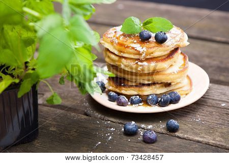 Delicious pancakes with blueberry and mint