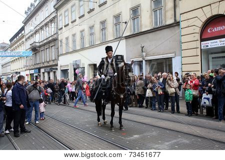 ZAGREB, CROATIA - OCTOBER 04: The parade of 70 participants, thirty horses and forty members of a brass band to the main square were announced next, 300th Sinjska Alka, on October 04, 2014 in Zagreb.