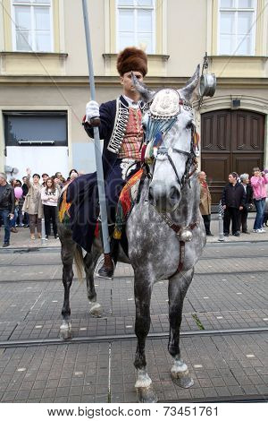 ZAGREB, CROATIA - OCTOBER 04: The parade of 70 participants, thirty horses and forty members of a brass band to the main square were announced next, 300th Sinjska Alka, on October 04, 2014 in Zagreb.