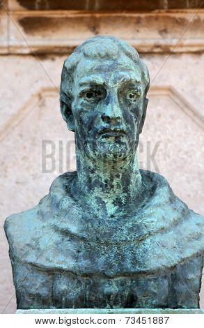 PRCANJ, MONTENEGRO - JUNE, 08: Statue of Andrija Kacic Miosic infront The Catholic Church of the Birth of the Virgin Mary, on June 08, 2012, in Prcanj, Montenegro